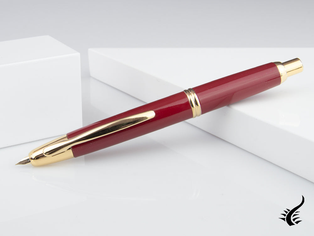 Stylo plume rétractable Pilot, or, rouge, « Capless »